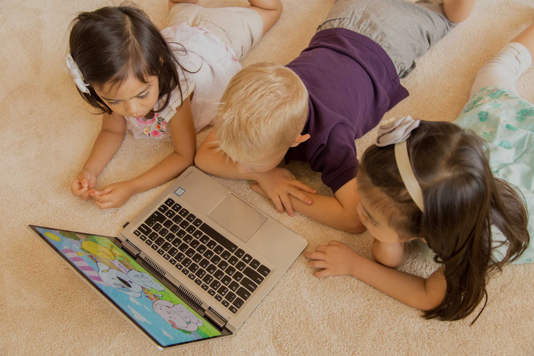 Photo of three children using a language-learning program from Jamma Jango.